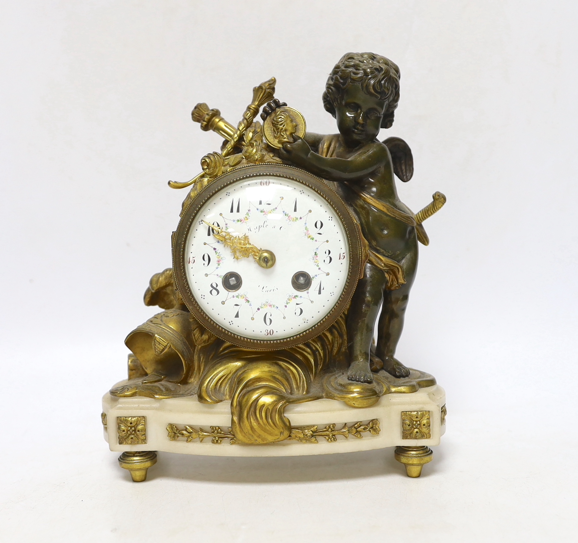 A French ormolu and bronze mantel clock striking on a bell, 22cm high